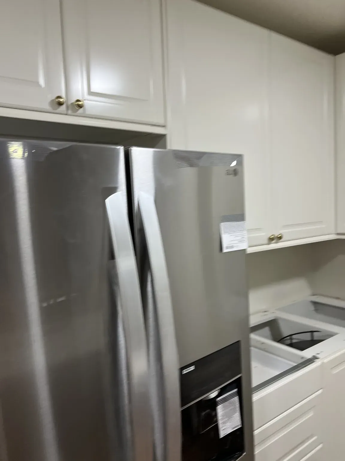 White Kitchen with Stainless Range